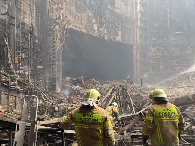 Rescuers work inside the Crocus City Hall. Picture: AFP