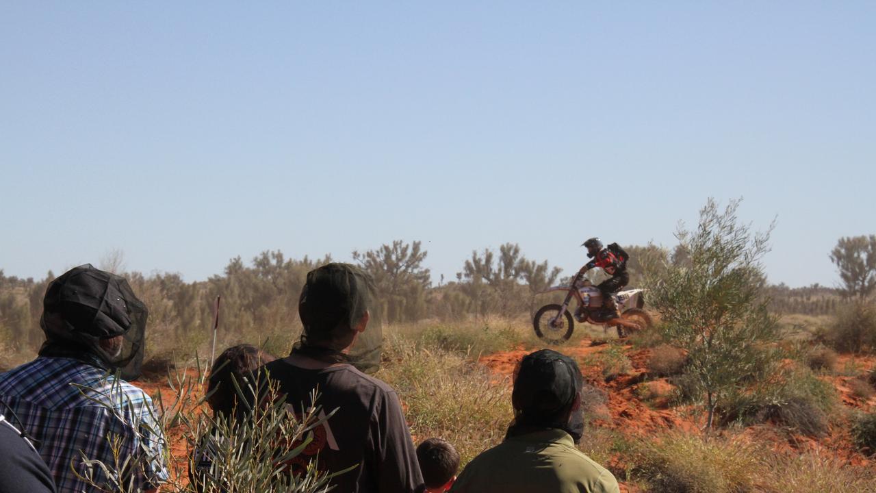 The 2025 Finke Desert Race has begun, with hundreds of punters lining the track south of Alice Springs to catch the action. Picture: Gera Kazakov