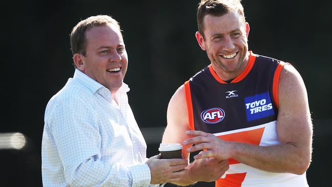 CEO David Matthews with GWS Giants player and Geelong legend Steve Johnson at training after he announced his retirement from football at the end of the season. Picture. Phil Hillyard