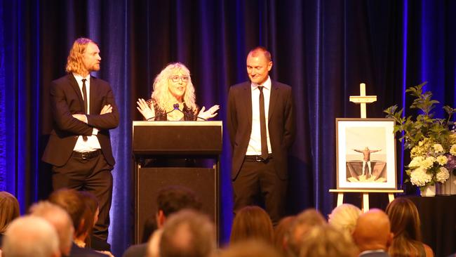 Michael Turner's wife Karen and sons Che and Levi at the memorial service. Picture: Alison Wynd