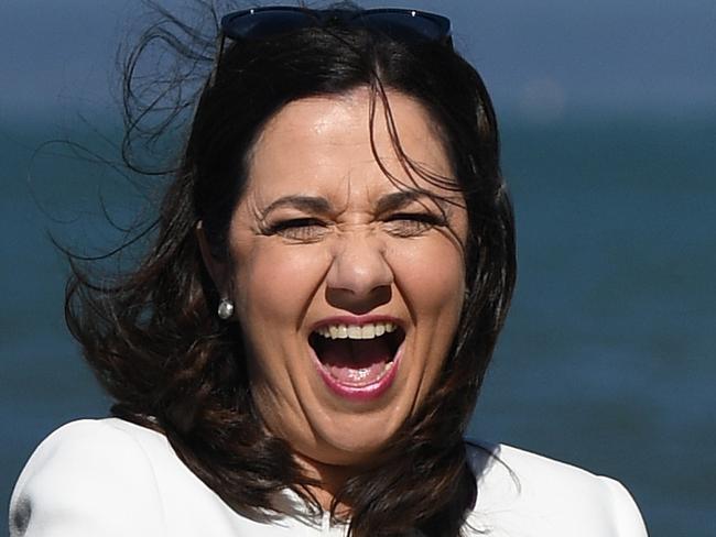 Queensland Premier Annastacia Palaszczuk laughs as she poses for a photo after meeting Labor volunteers in Brisbane, Friday, November 24, 2017. Ms Palaszczuk is on the campaign trail ahead of tomorrow's state election. (AAP Image/Dan Peled) NO ARCHIVING