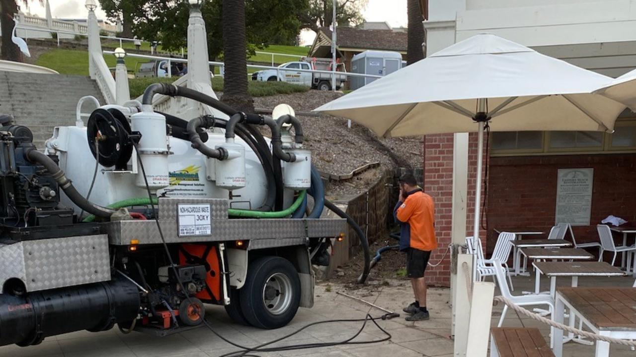 Geelong council crews clean up after the sewerage system failed at Eastern Beach over the New Year’s long weekend.