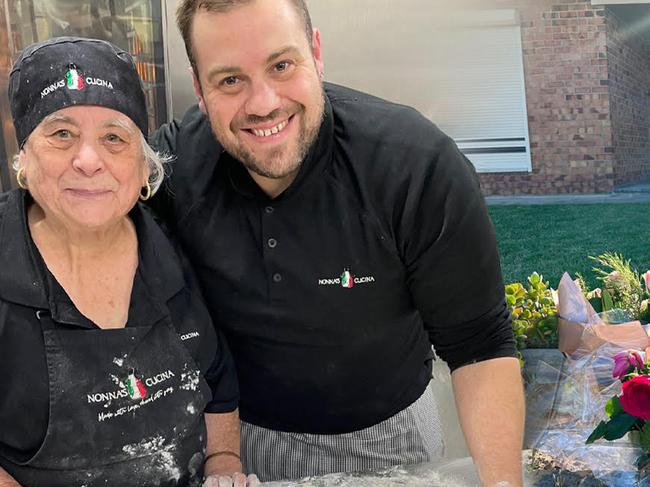 Nonna Maria and her grandson and floral tributes