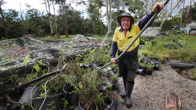 Brian Reichelt from Foilage Farm in January surveying the damage following the destructive storms and floods. Picture Glenn Hampson