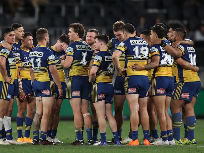 Eels players form a huddle after their loss in the NRL Semi Final between the Parramatta Eels and South Sydney Rabbitohs at Bankwest Stadium, Parramatta. Picture: Brett Costello