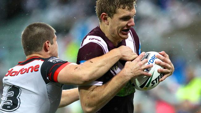 Manly fullback Tom Trbojevic evades Warrior Blake Ayshford on the way to the tryline. Picture: AAP