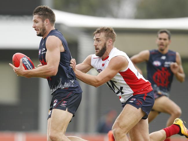 Jesse Hogan got the better of Lynden Dunn to kick four second-half goals in Melbourne’s intra-club game. Picture: Michael Klein