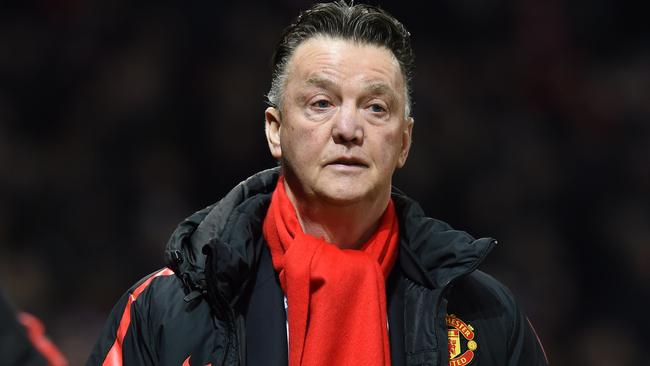 Manchester United's Dutch manager Louis van Gaal arrives ahead of the FA Cup fourth round replay football match between Manchester United and Cambridge United at Old Trafford in Manchester, north west England, on February 3, 2015. AFP PHOTO / PAUL ELLIS == RESTRICTED TO EDITORIAL USE. No use with unauthorized audio, video, data, fixture lists, club/league logos or “live” services. Online in-match use limited to 45 images, no video emulation. No use in betting, games or single club/league/player publications. ==