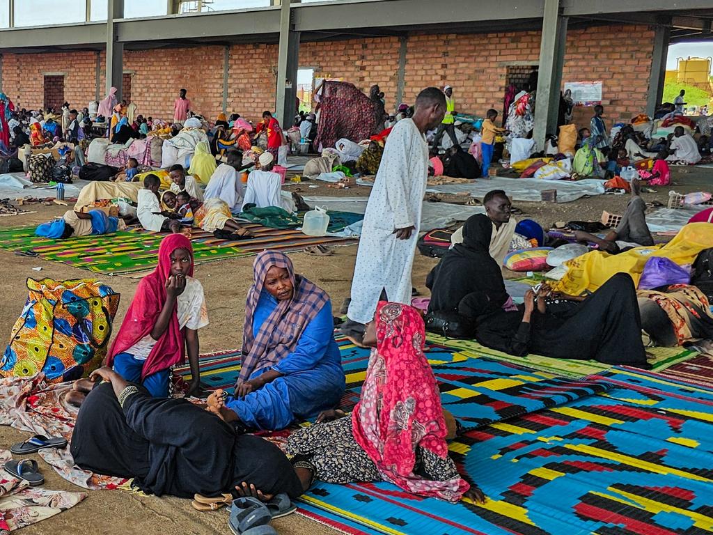 Displaced children and families shelter under an unfinished building in Minah Al Berih at the entrance of Gedaref state. Picture: UNICEF