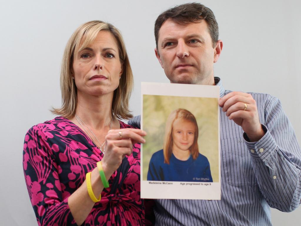 Kate and Gerry McCann hold an age-progressed police image of their daughter back in 2012. Picture: Dan Kitwood/Getty Images