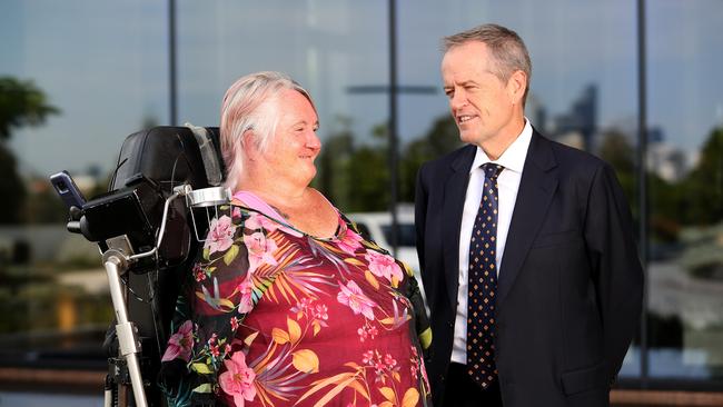 Bill Shorten speaks with thalidomide survivor Monica McGhie. Picture: Colin Murty