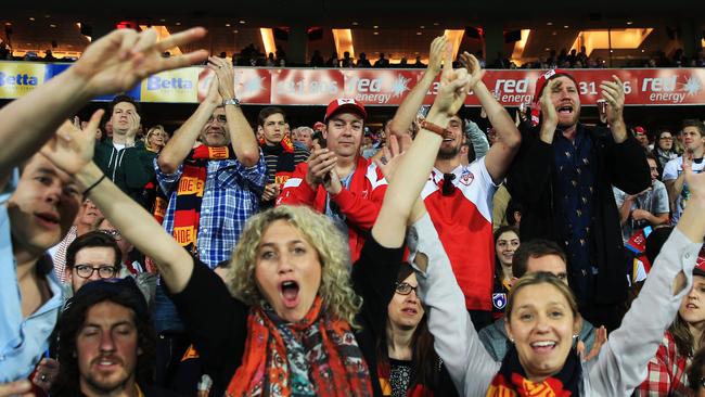 Swans fans cheer on their team. Picture: Toby Zerna