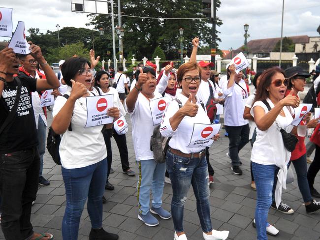 Indonesians holding a rally against repatriation of IS combatants. Picture: AFP