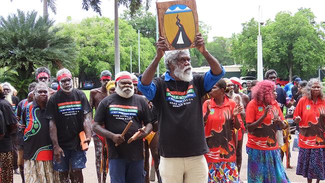 Darwin, NT, 12/2/25: Thamarrurr region leader William Parmbuk holds up the petition. Dozens of Wadeye residents travelled to Parliament House to deliver a petition calling on the government to commit to funding upgrades to Port Keats Rd. Picture: Fia Walsh.