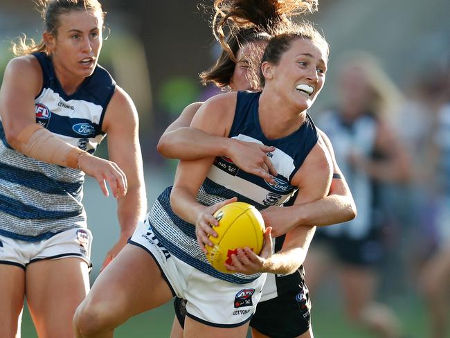 Georgie Rankin of the Cats is tackled by Sarah Dargan of the Magpies during the 2019 NAB AFLW Round 01 match between the Geelong Cats and the Collingwood Magpies at GMHBA Stadium. Picture: Michael Willson/AFL Media.