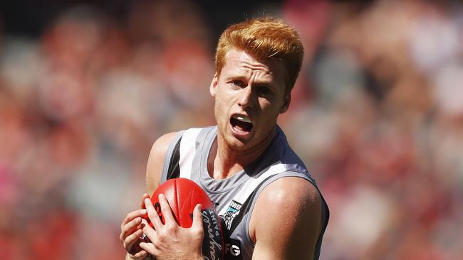 Willem Drew of the Power marks the ball during his impressive Round 1 debut. Picture: AAP Image/Daniel Pockett