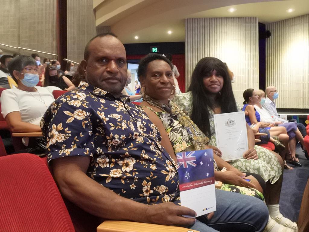 Originally from Papua New Guinea, new Aussies (from left) Dickson Ikis, Penni Ikis and Matron Ikis attend the ceremony at the MECC on Australia Day, January 26, 2022. Mr Ikis said there was a lot of opportunity in Australia compared to PNG. Wednesday, January 26, 2022. Mackay Australia Day 2022. Mackay Citizenship Ceremony 2022. Picture: Duncan Evans
