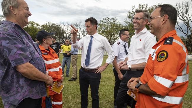 NSW Opposition leader Chris Minns and premier Dominic Perrottet at this evening’s service at Lismore. Picture: NCA NewsWire / Natalie Grono