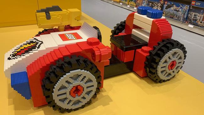 Little people can sit in this vehicle model at the LEGO store at Westfield Chermside. Picture: Michelle Smith