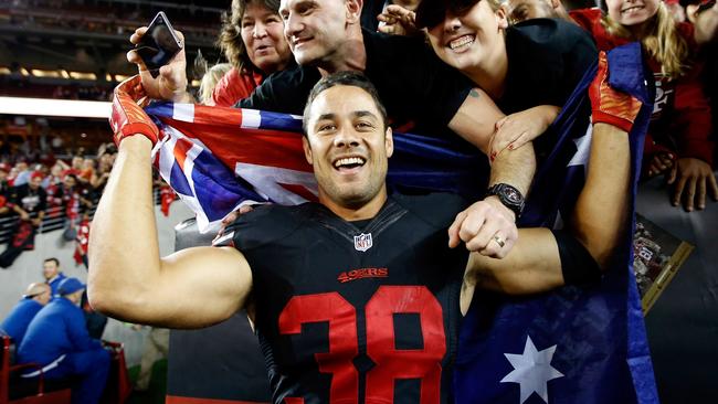 SANTA CLARA, CA — SEPTEMBER 14: Jarryd Hayne #38 of the San Francisco 49ers poses with fans after the 49ers beat the Minnesota Vikings in their NFL game at Levi's Stadium on September 14, 2015 in Santa Clara, California. (Photo by Ezra Shaw/Getty Images)