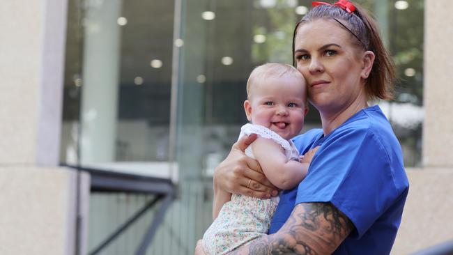 ‘It’s not safe for patients’.... nurse Alex Crawley and her baby Mia. Picture: NCA NewsWire / David Swift