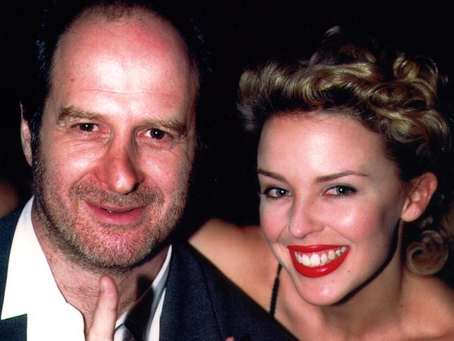 Australian music entrepreneur and Mushroom Group founder Michael Gudinski, pictured with pop musician Kylie Minogue in 1994. Picture: Tony Mott