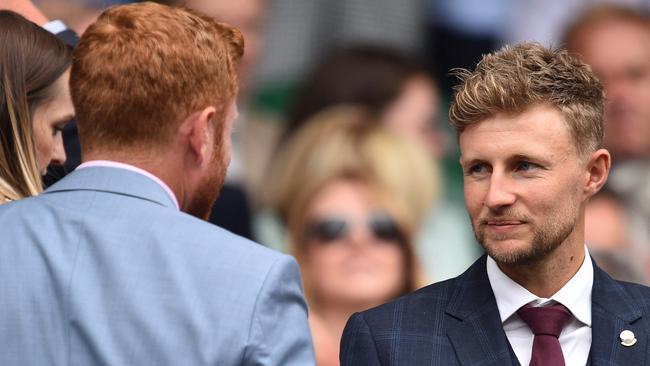 Joe Root (right) and England teammate Jonny Bairstow in the Royal Box at Wimbledon. Picture: AFP