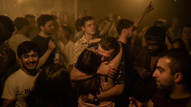 Two people hug in the middle of the dancefloor at Egg London nightclub in the early hours of July 19 in London as restrictions are dropped. Picture: Getty Images