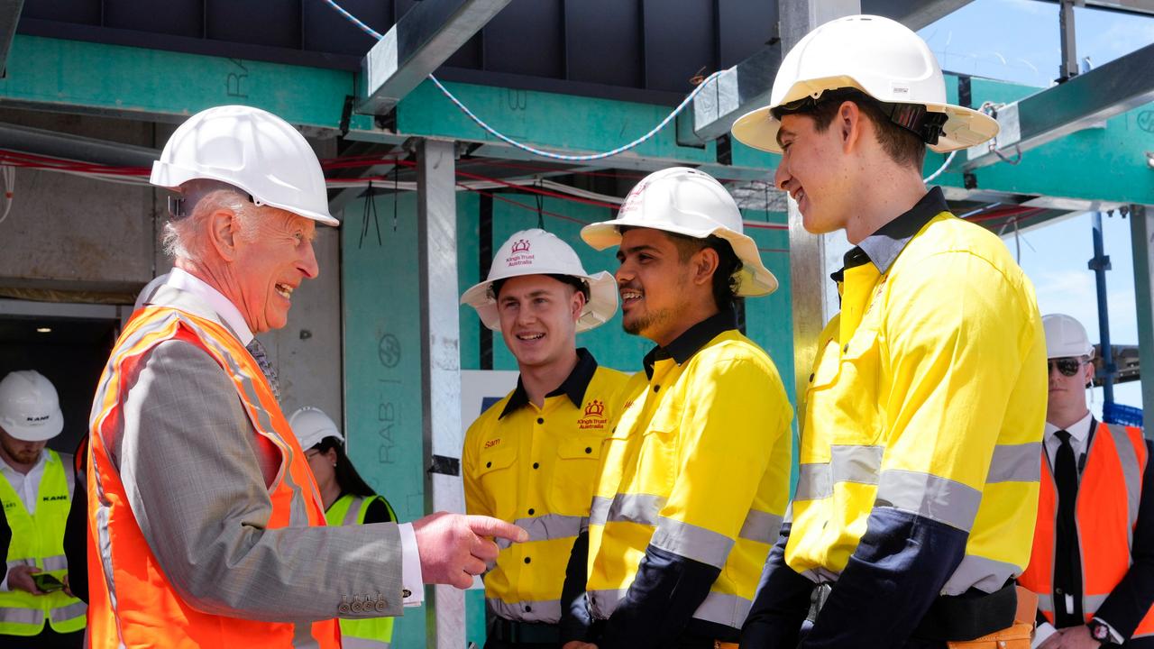 King Charles III talks to apprentices at the Homes NSW Cowper Street development in Sydney. Picture: AFP