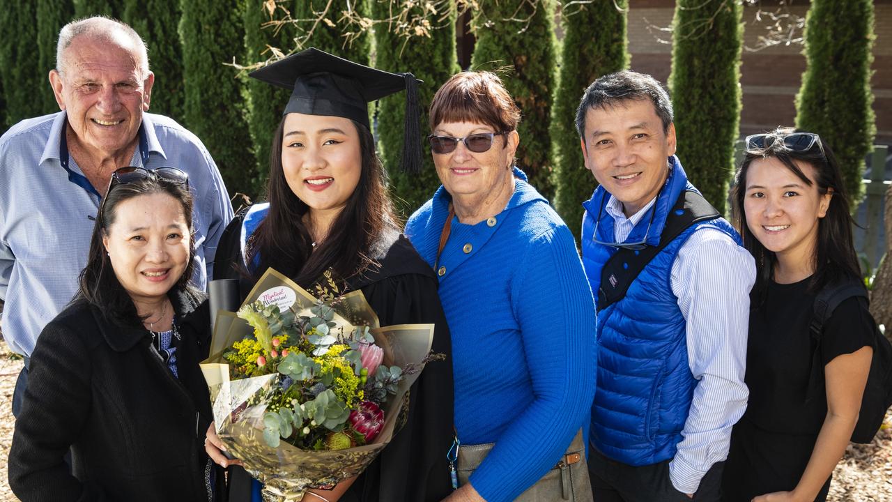 At a UniSQ graduation ceremony are (from left) Ross Marquard, Doris Liew, Rylie Pan graduating with a Bachelor of Science (Honours) (Environment &amp; Sustainability), Julka Marquard, Han Seng Pan and Penny Pan at Empire Theatres, Wednesday, June 28, 2023. Picture: Kevin Farmer
