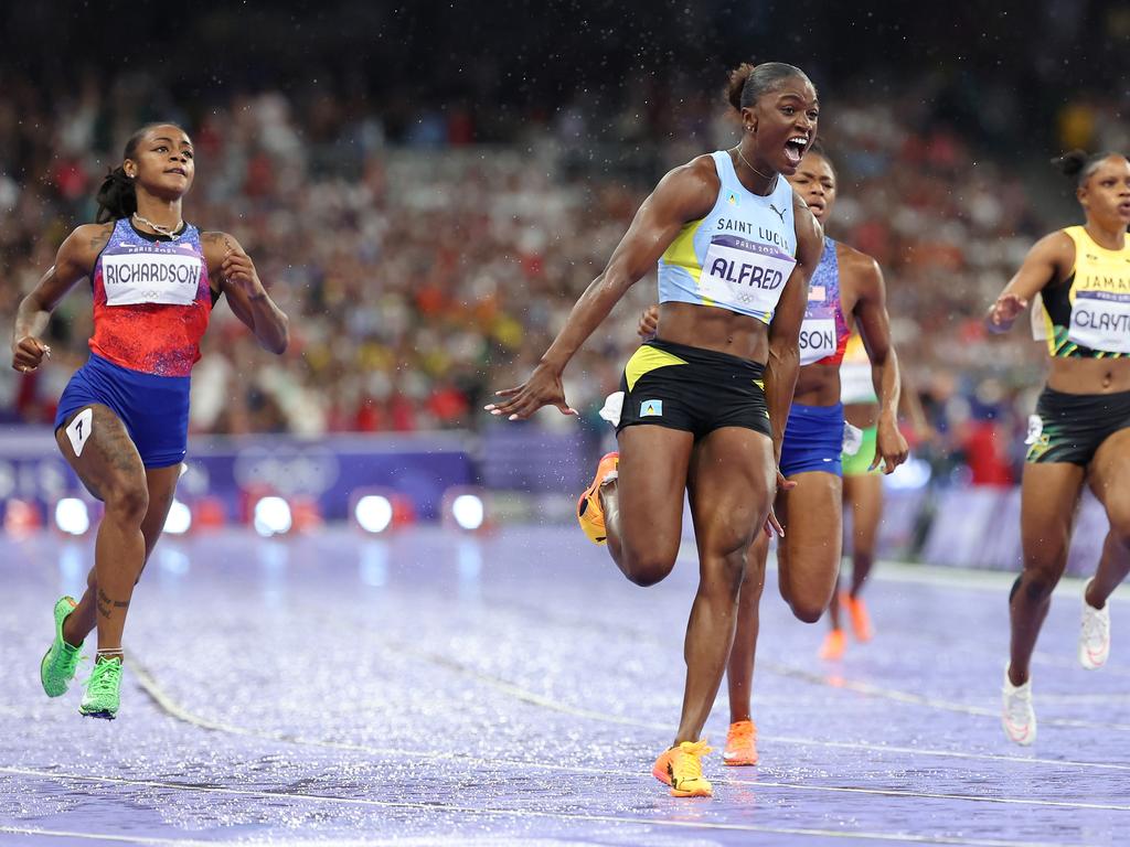 Julien Alfred is ecstatic at winning the 100m. Picture: Hannah Peters/Getty Images