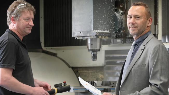 Stärke AMG chief executive Grant Tinney, right, with CNC programmer Doug Foster at the company's Gillman facility. Picture: Dean Martin