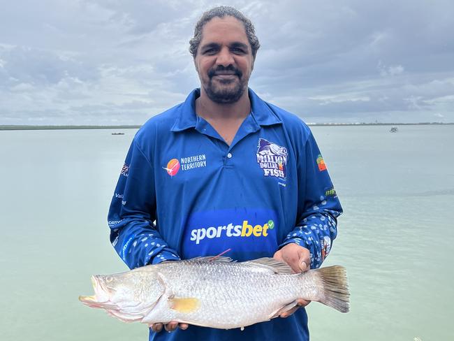 James Mawson is the first to catch a red tagged barra this year. Picture: Supplied.