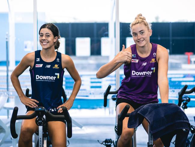 Ava Black (left) works in the gym with Sunshine Coast Lightning teammate Reilley Batcheldor.