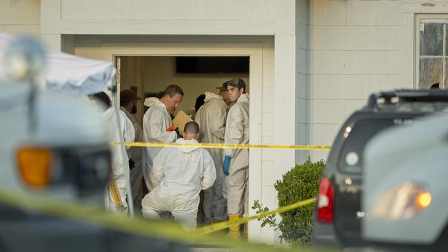 Forensic officers inside the church at Sutherland Springs. Picture: AP