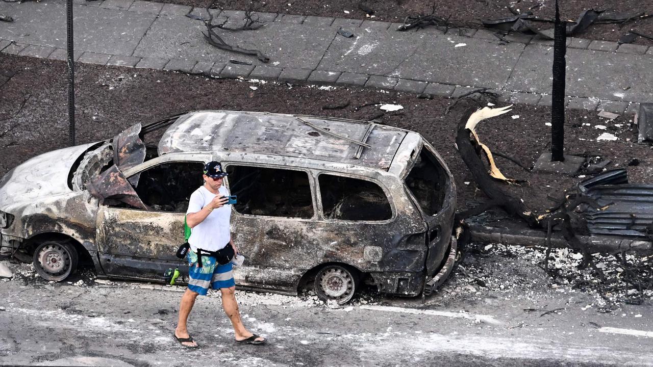 A destroyed car in the aftermath of wildfires in western Maui in Lahaina, Hawaii. (Photo by Patrick T. Fallon / AFP)