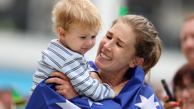 Jess Stenson celebrates with Billy after winning gold in the Commonwealth Games marathon. Picture: Getty Images