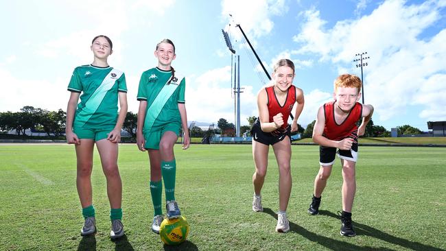 Far North and Gulf representative football players Matilda Simpson, 14, and Bella Southwell, 12, and Cairns athletics members Piper Devine, 17, and Quinn Lenton-Cater, 11, will enjoy the spoils of upgraded facilities at Barlow Park, part of the Minor Venue Program upgrades ahead of the 2032 Olympic Games. Picture: Brendan Radke