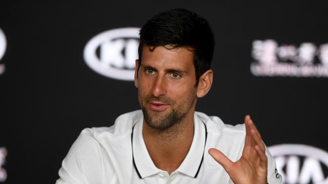 Novak Djokovic of Serbia speaks to the media during a press conference ahead of the Australian Open tennis tournament in Melbourne, Sunday, January 13, 2019. (AAP Image/Lukas Coch) NO ARCHIVING, EDITORIAL USE ONLY