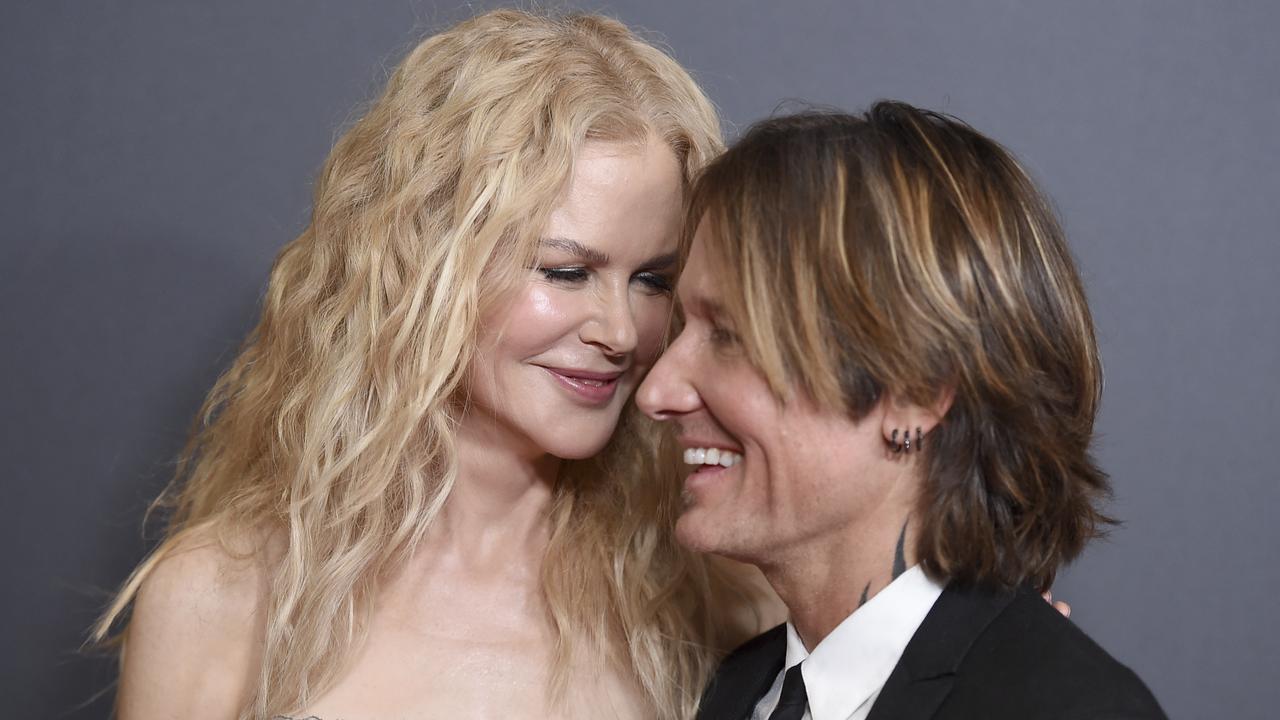 Loved up: Another red carpet with husband Keith Urban. Picture: AP