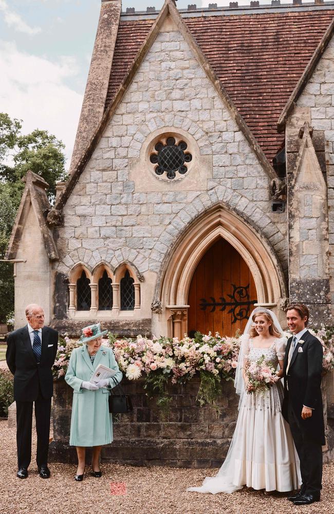 Princess Beatrice on her wedding day with Queen Elizabeth II and Prince Philip. Picture: Benjamin Wheeler/Buckingham Palace/AFP