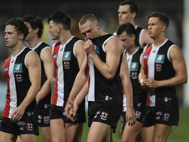 CAIRNS, AUSTRALIA - JUNE 12: The Saints walk from the field after losing the round 13 AFL match between the St Kilda Saints and the Adelaide Crows at Cazaly's Stadium on June 12, 2021 in Cairns, Australia. (Photo by Ian Hitchcock/Getty Images)