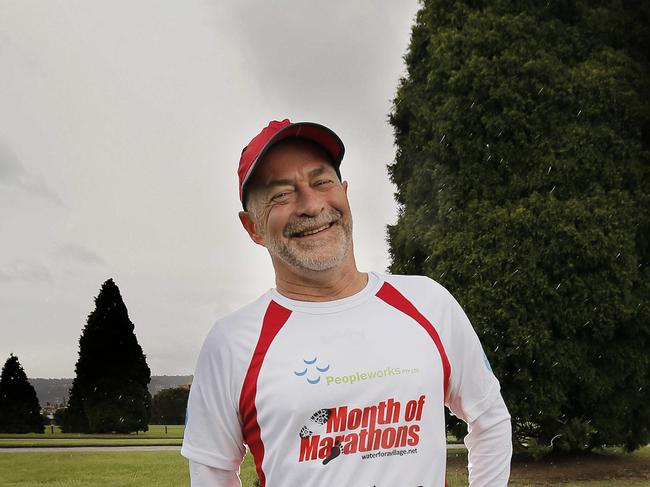 Runner Peter Wheatley is a human guinea pig for sports scientists at UTAS. He is running a marathon a day for a month to see whether excessive exercise harms the body. Picture: MATHEW FARRELL Picture taken at the Hobart Cenotaph