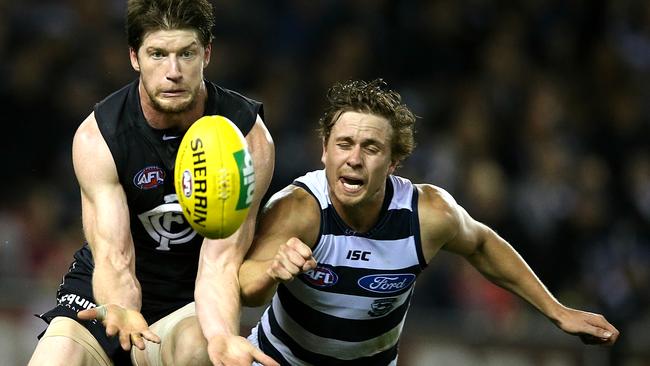 Round 12: Geelong v Carlton Sam Rowe marks in front of Mitch Duncan Picture : Wayne Ludbey .