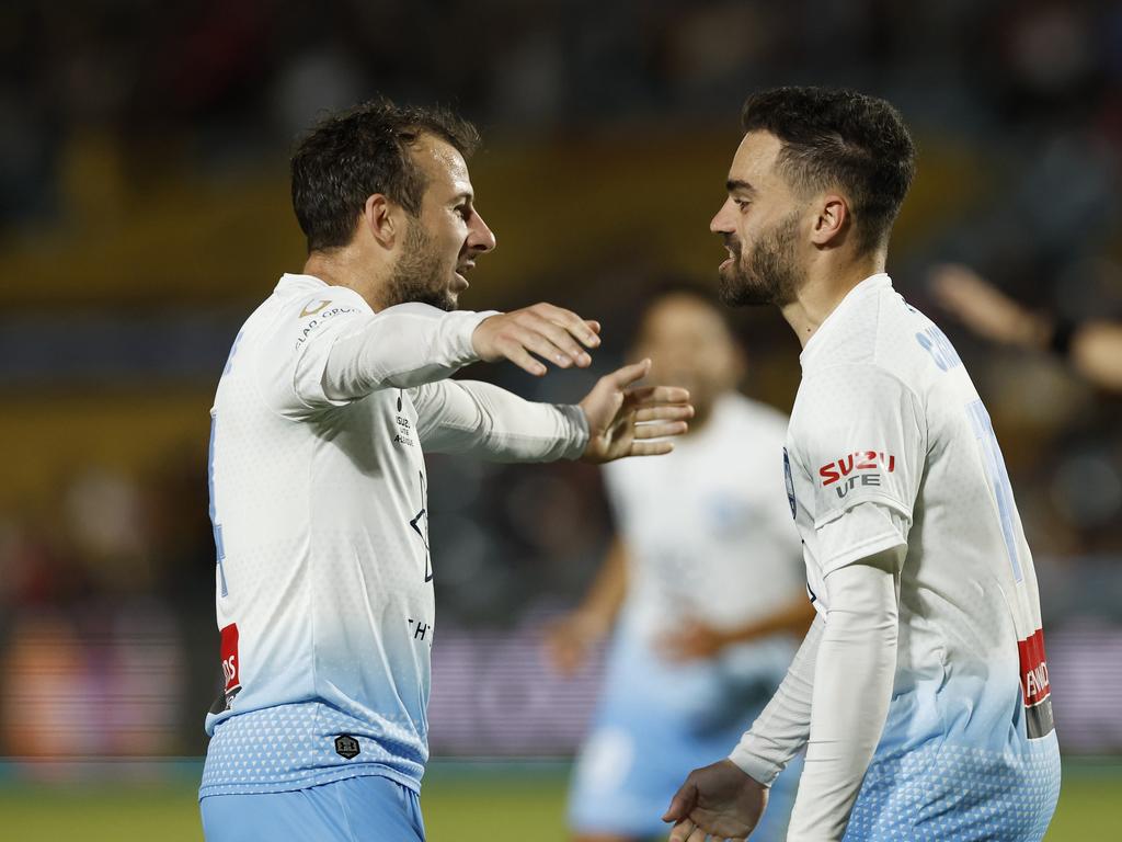 Sydney FC goalscorers Adan Le Fondre (left) and Anthony Caceres celebrate in Gosford. Picture: Mark Evans/Getty Images