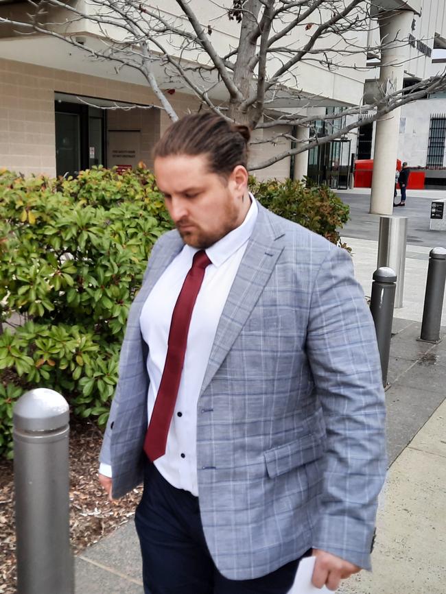 Jake Low, 28, leaves the ACT Magistrates Court. Picture: Craig Dunlop