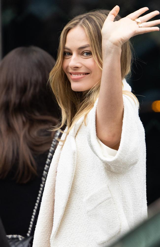 Margot Robbie accessorises with $5500 Chanel AirPods case