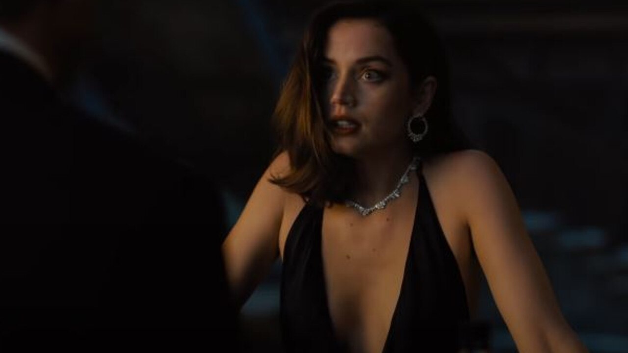 Ana De Armas rocks a gown and a high kick