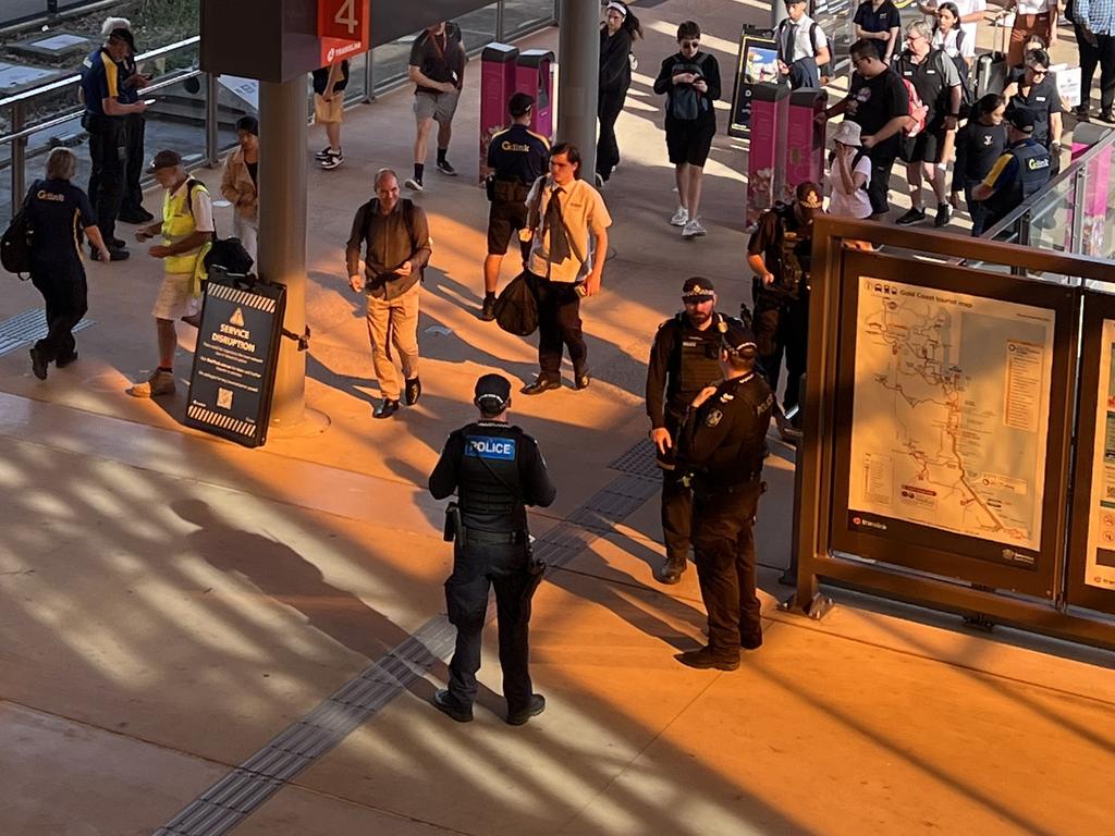 Police at Helensvale Train Station on Wednesday.