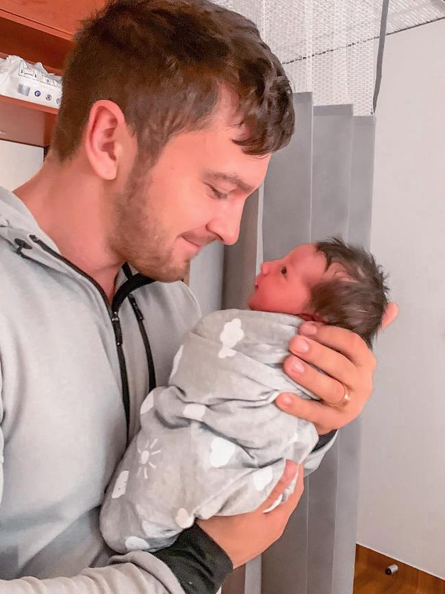 The proud dad with his bundle of joy, Arna Leia Pearce who was born last week. 